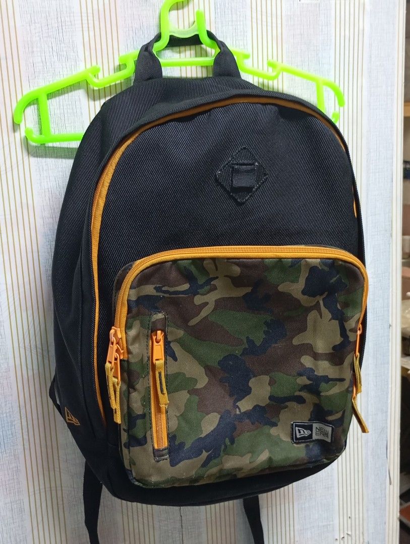 New Era Camo Backpack (Category: Backpacks) located in Manila. Submitted by japz29 (Listing ID 1428215984, Image 1). Description: New Era bag, backpack, camouflage pattern FROM JAPAN!!.