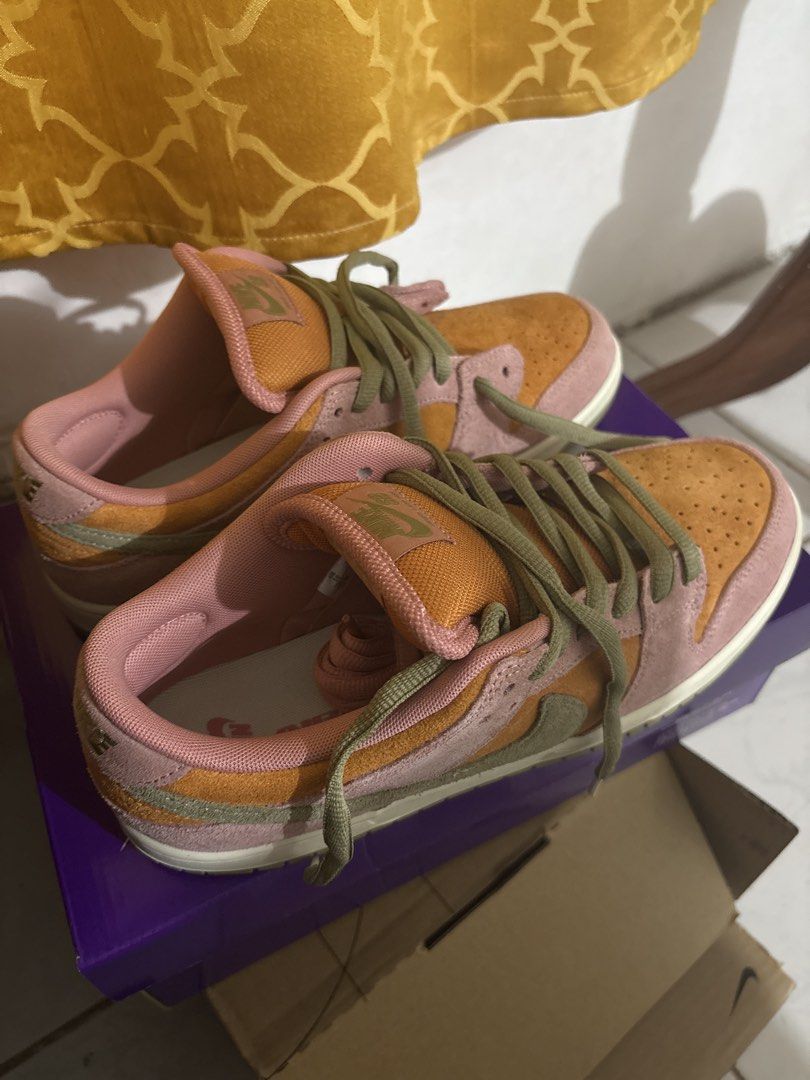 Nike SB Dunk Low (Category: Sneakers) located in San Pedro. Submitted by yowyow123 (Listing ID 1428102431, Image 1). Description: Nike Sb Dunk Low Red Stardust/Monarch/Coconut Milk/Neutral Olive Size 10 Only used for multiple times..