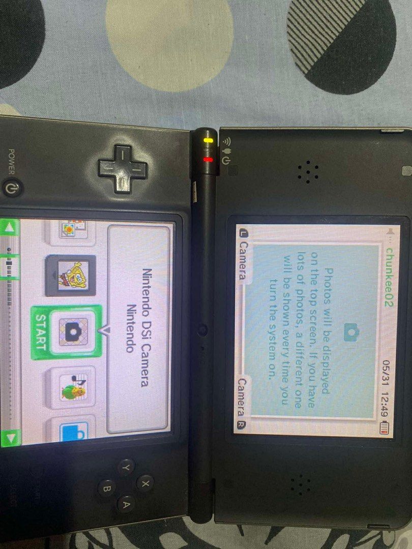 Nintendo DSi XL (Category: Nintendo) located in Manila. Submitted by sakuraa09997 (Listing ID 1428137551, Image 2). Description: Nintendo DSi XL (Bronze) - Unit Only 🎮 Selling my pre-loved Nintendo DSi XL. Still works perfectly (see photos of it running Pokémon). Great for collectors or those who want the best screens for DS gaming! ✅ Price: (Slightly negotiable) ✅ Condition: Tested & Working. Buttons and touch screen are responsive. ✅ Inclusion