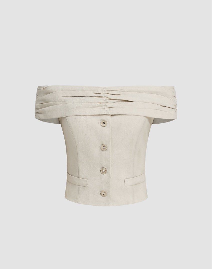 Cider Off-Shoulder Top (Category: Blouses) located in Cebu City. Submitted by declutterwithmecebu (Listing ID 1428238299, Image 3). Description: Elegant off-shoulder top in a neutral color. Features a ruched neckline and button-down front. Includes two small pockets. A versatile piece suitable for various occasions..