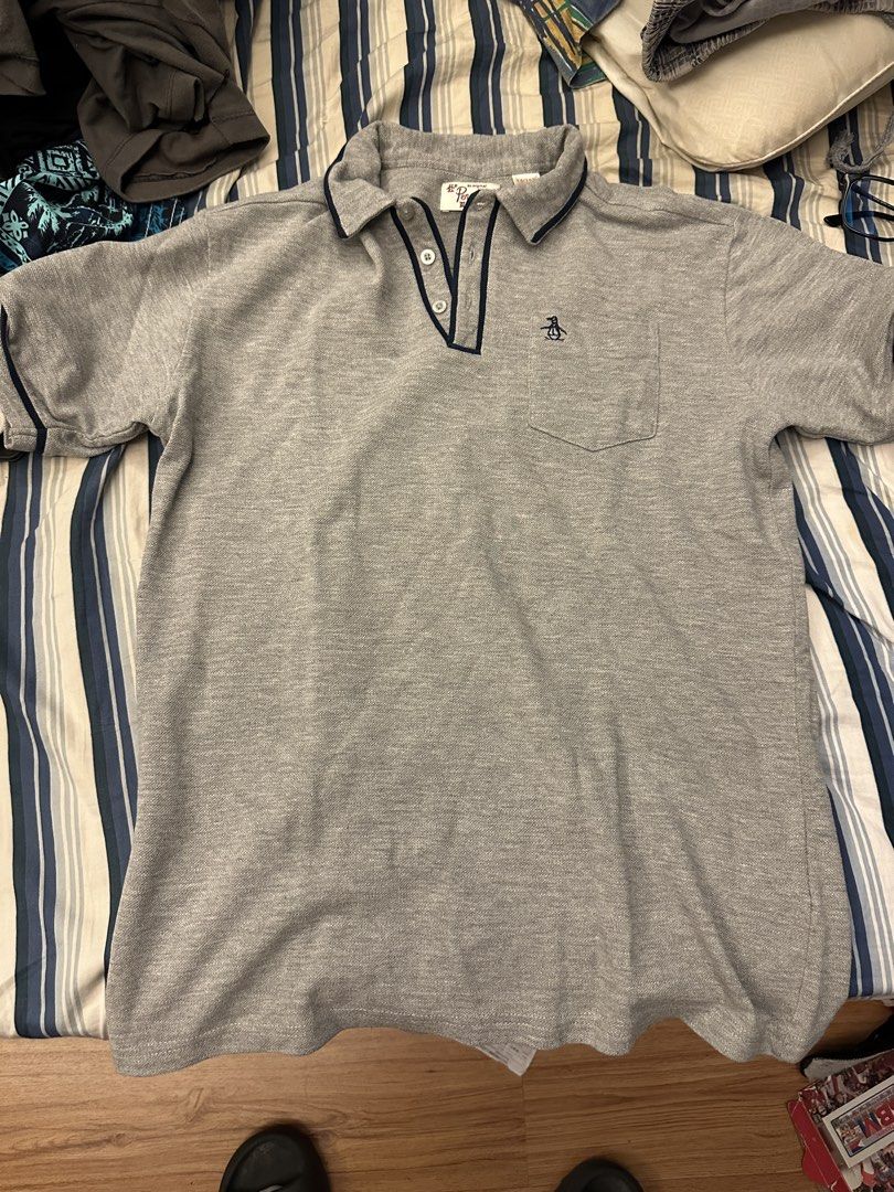 Original Penguin Gray Polo Shirt (Category: Tshirts & Polo Shirts ) located in Pasig City. Submitted by cmdrod303 (Listing ID 1428214110, Image 1). Description: Penguin authentic polo shirt 18 x 24 Negotiable RFS: Too small for me now.