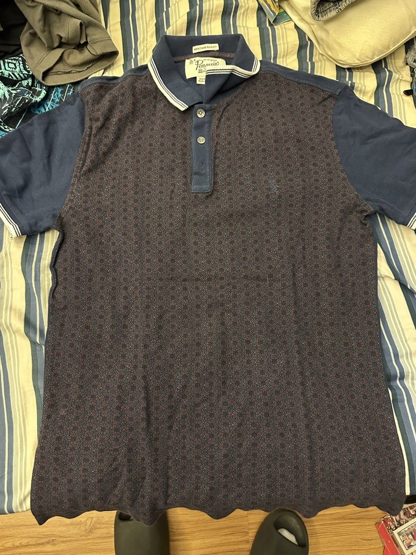 Original Penguin Polo Shirt (Category: Tshirts & Polo Shirts ) located in Pasig City. Submitted by cmdrod303 (Listing ID 1428214111, Image 1). Description: Penguin authentic polo shirt 18 x 24 Negotiable RFS: Too small for me now.