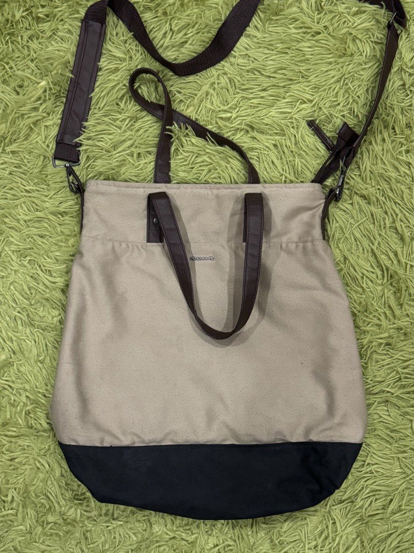Penshoppe Two-Way Tote/Sling Bag (Category: Sling Bags) located in Pasig City. Submitted by peter_german (Listing ID 1428098000, Image 1). Description: Lightly used and still in good shape. Spacious, practical, and easy to carry with both top handles and a long strap for added versatility..