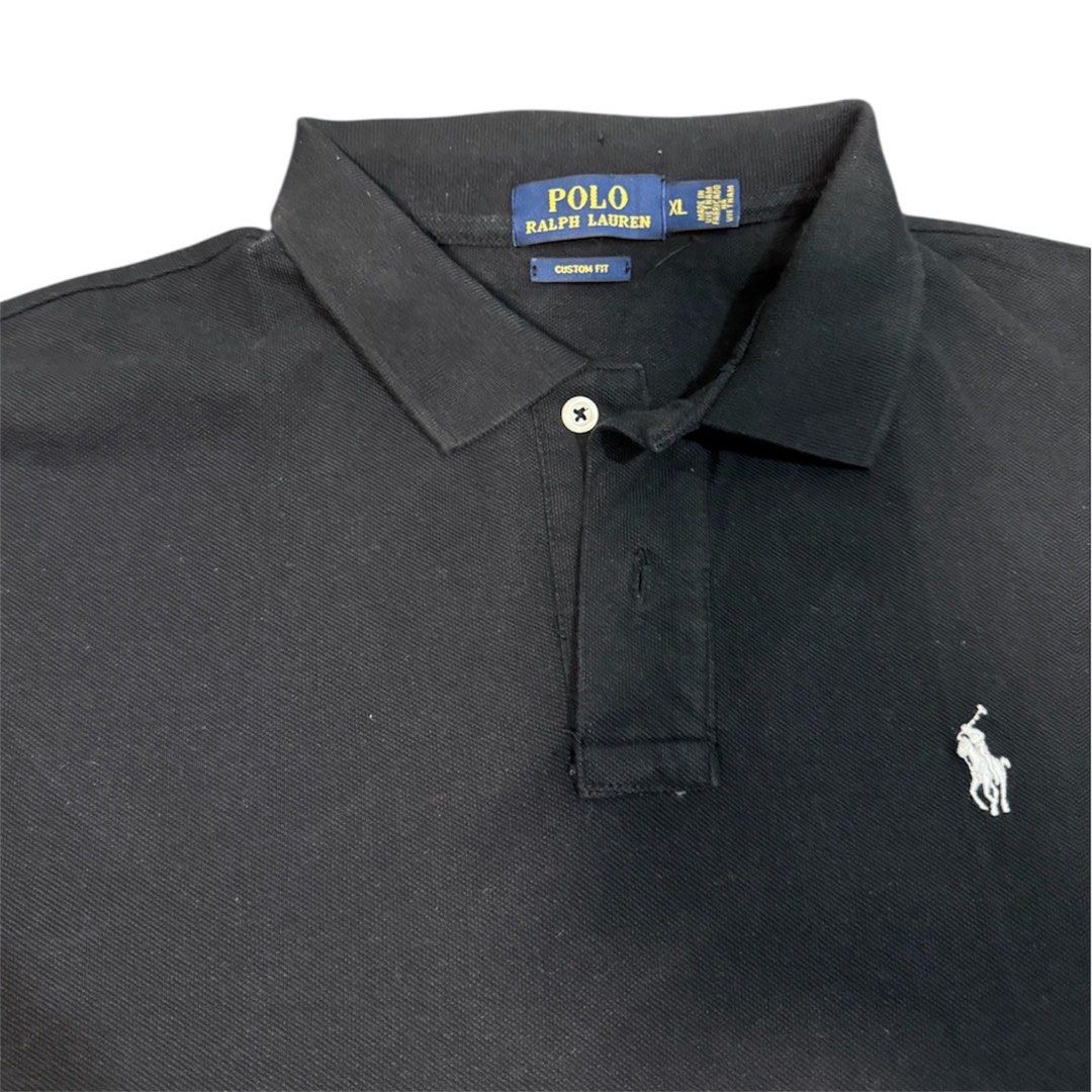 Polo Ralph Lauren black polo (Category: Tshirts & Polo Shirts ) located in Manila. Submitted by dja23 (Listing ID 1428206592, Image 2). Description: Width: 21.5 in Length: 28 in front, 29.5 in back Sleeve: 9 in Off/legit, signs of usage on collar.