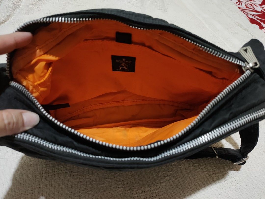 Porter International Black Sling Bag (Category: Sling Bags) located in Quezon City. Submitted by jhaneth21 (Listing ID 1428181791, Image 3). Description: Complete Logos & Tags Hardware Logos Color Rate: 9/10 Velcro Intact Size: 13"x 9" x 3" .