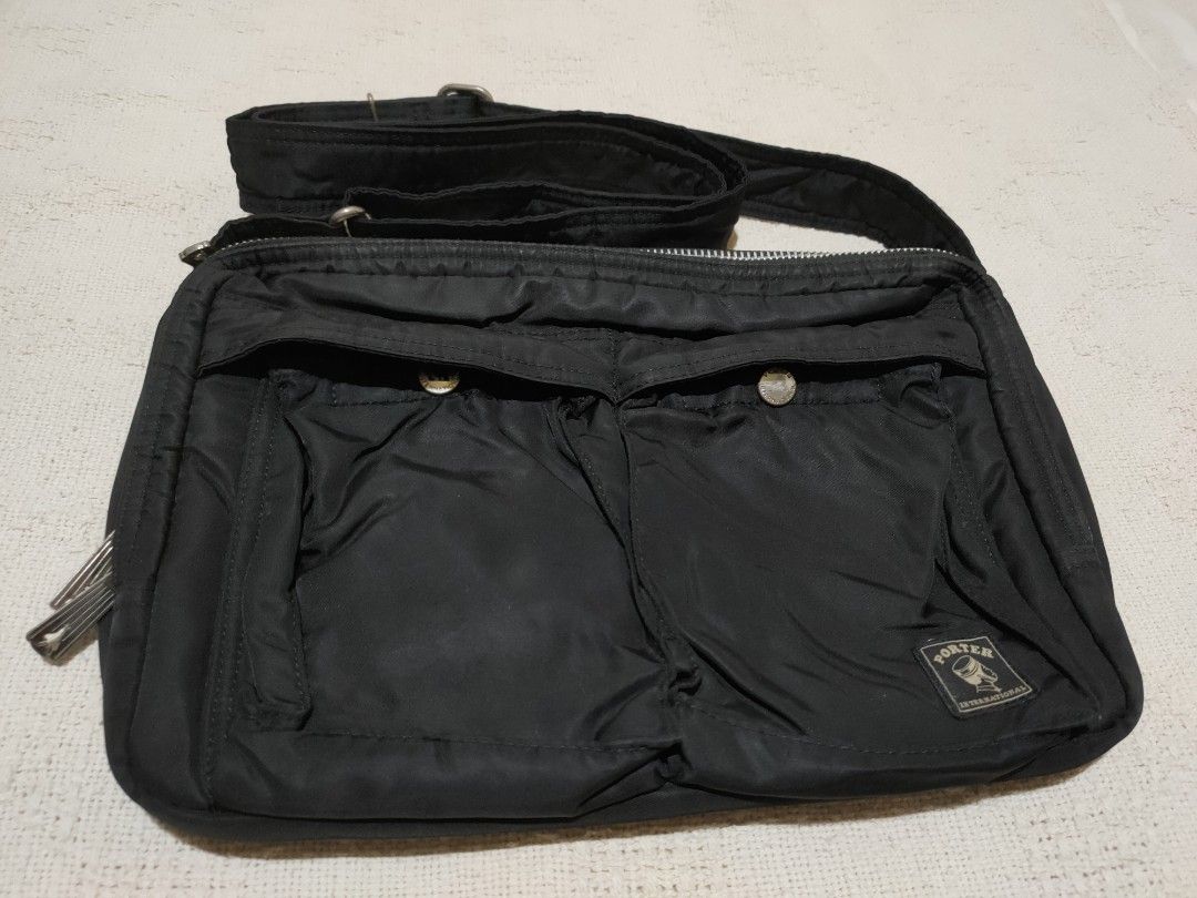 Porter International Black Sling Bag (Category: Sling Bags) located in Quezon City. Submitted by jhaneth21 (Listing ID 1428181791, Image 1). Description: Complete Logos & Tags Hardware Logos Color Rate: 9/10 Velcro Intact Size: 13"x 9" x 3" .