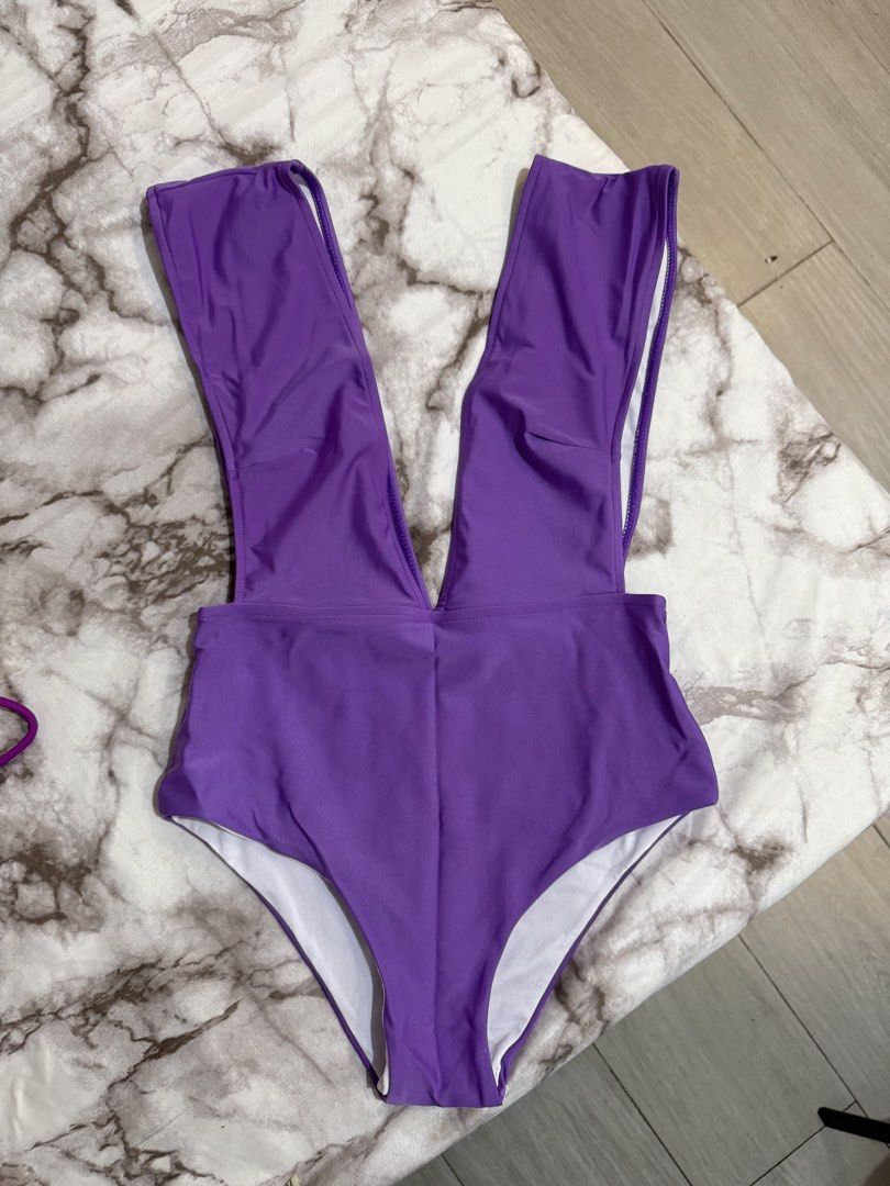 Purple Plunge Neck Swimsuit (Category: Bikinis & Swimsuits) located in Quezon City. Submitted by soloqueenph (Listing ID 1428167701, Image 1). Description: .