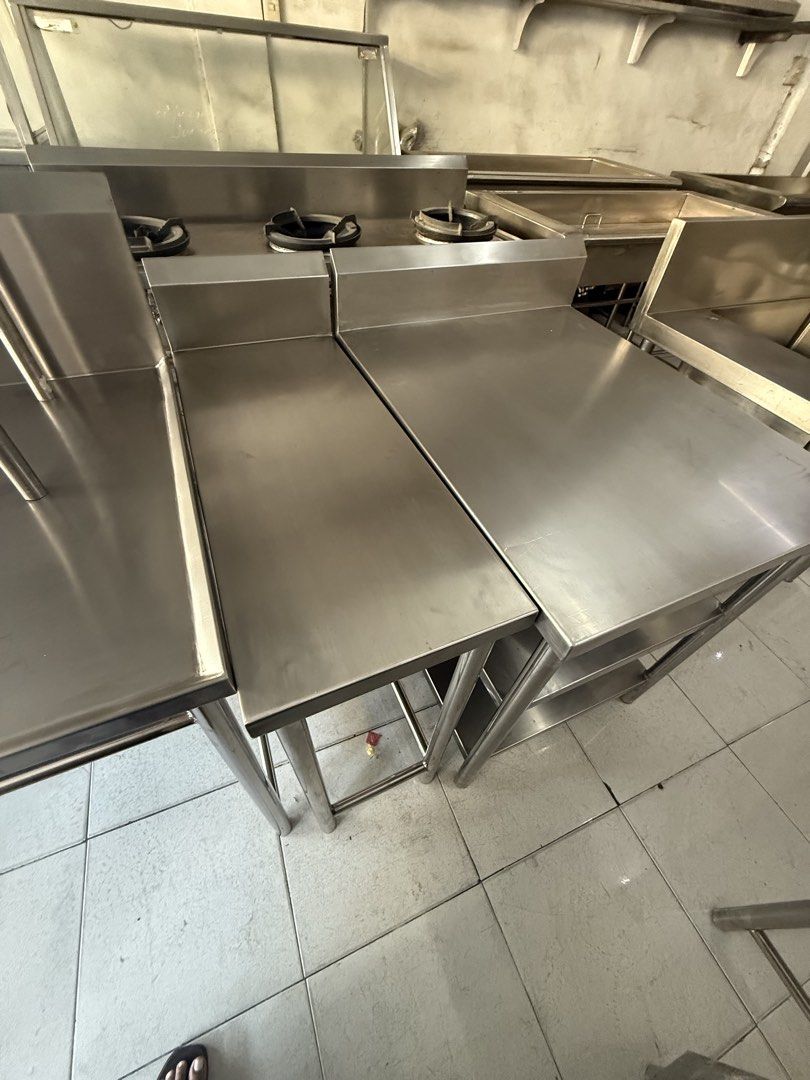 Stainless Filler Table (Category: Bakeware) located in Valenzuela. Submitted by jcsi_stainless (Listing ID 1428227849, Image 1). Description: **ON HAND** STAINLESS FILLER TABLE DIM: 33.3CM X 81CM X 85CM LWH + 15 CM BS GAUGE 18 1.2MM ALL 304 STAINLESS MATERIAL BEFORE: 12,000.00 PHP NOW: 6,000.00 PHP Readily available for pick-up or delivery. * AVAILABLE IN VALENZUELA DALANDANAN BRANCH All newly fabricated items. Specs/details are posted. Message u