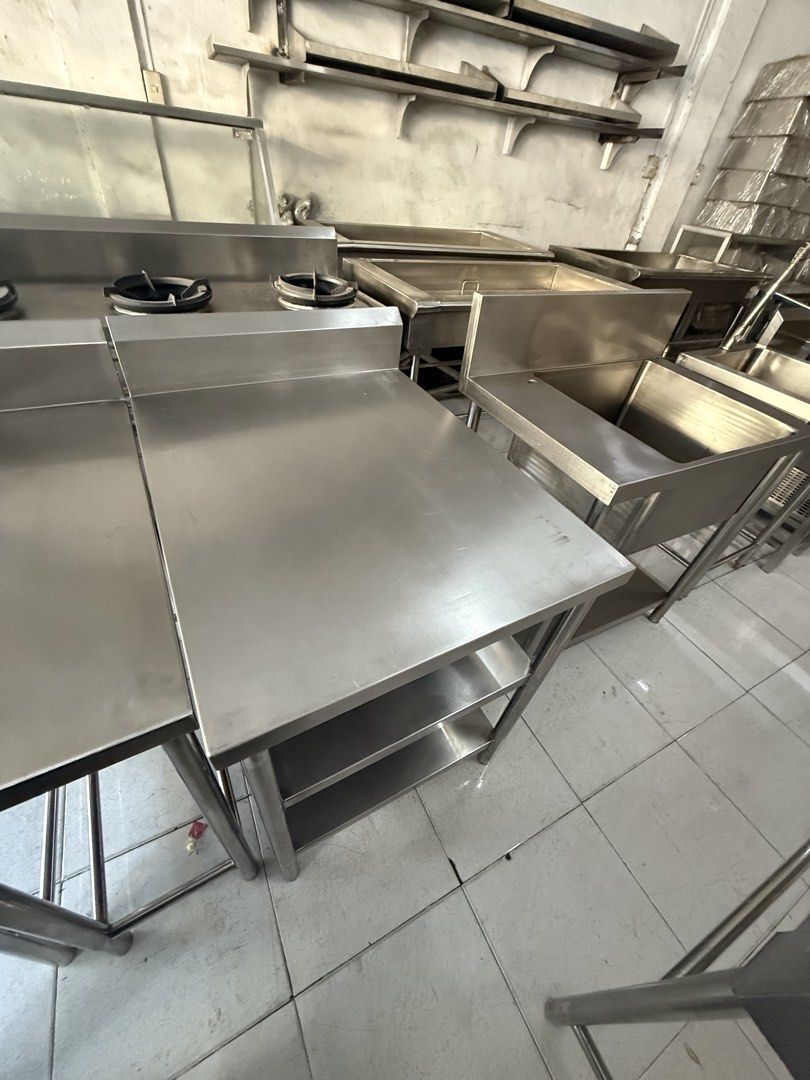 Stainless Kitchen Table with Shelves (Category: Tables & Sets) located in Valenzuela. Submitted by jcsi_stainless (Listing ID 1428228186, Image 1). Description: **ON HAND** STAINLESS FILLER TABLE DIM: 65.3CM X 85CM X 85CM LWH + 15 CM BS Old Display stock with little marks GAUGE 18 1.2MM ALL 304 STAINLESS MATERIAL BEFORE: 17,000.00 PHP NOW: 10,000.00 PHP Readily available for pick-up or delivery. * AVAILABLE IN VALENZUELA DALANDANAN BRANCH All new