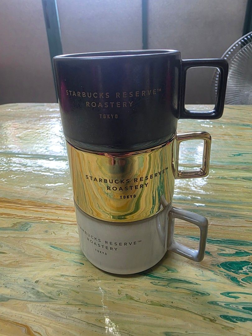 STARBUCKS reserved cups (Category: Coffee & Tea Tableware) located in Valenzuela. Submitted by scarletangel35 (Listing ID 1428122906, Image 1). Description: 1 set ( 3 espresso cups) 1 gold/ 1 silver/ 1 white original starbucks cups from tokyo.