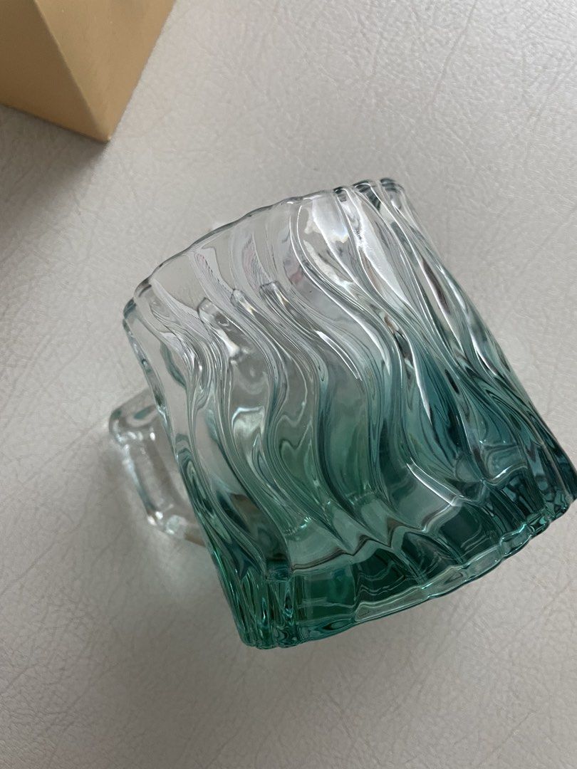 Starbucks Water Relief Glass mug (Category: Home Improvement Tools & Accessories) located in Davao. Submitted by goldcarp (Listing ID 1428097445, Image 2). Description: For sale: Starbucks China Summer Mint Green Water Ripple Relief Glass Mug RARE! Condition: Brand New Authentic. Complete set w box. Description: This hard to find mug features a textured, ripple-like design in a mint green and clear gradient finish with a silver Starbucks Siren lo
