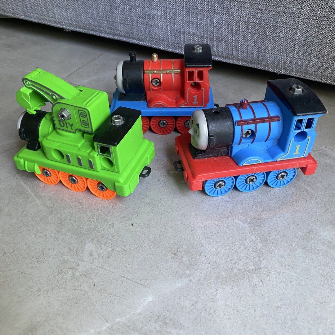 Toy Train Set (Category: Vehicle & Diecast Models) located in Taguig. Submitted by mixmix16 (Listing ID 1428105645, Image 2). Description: Set of three toy trains. Imitation Thomas & Friends.