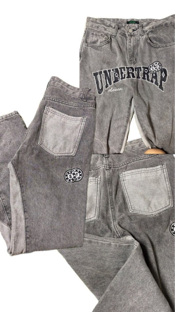 Undertrap Eleven Gray Jeans (Category: Jeans) located in Manila. Submitted by isha0629 (Listing ID 1428127847, Image 1). Description: Gray Undertrap Eleven jeans. Features a unique design with "UNDETRAP" printed on the front. Includes two back pockets and a small patch with a casino chip design. The jeans have a straight leg cut and a button and zipper closure..