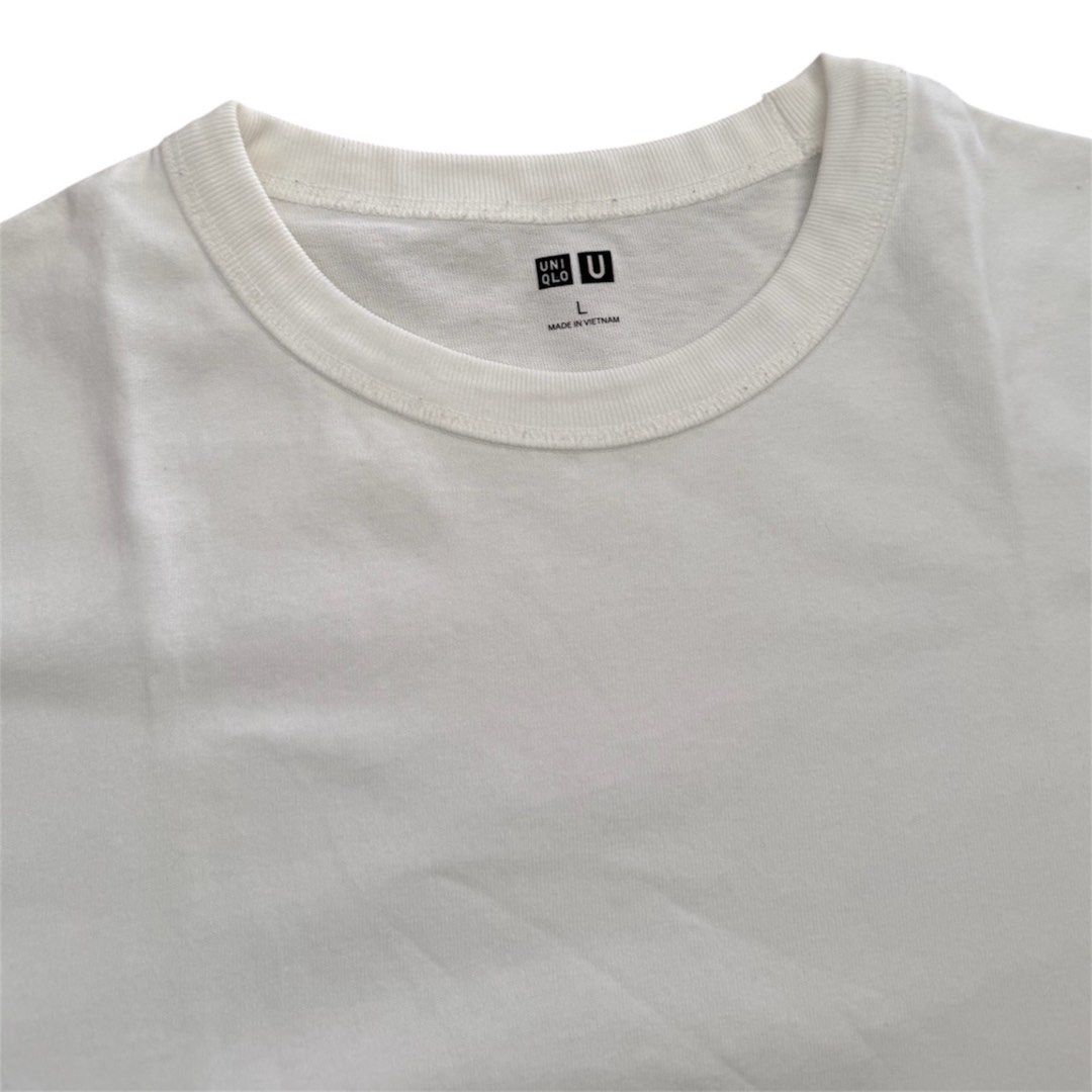Uniqlo U white Crew Neck Tee (Category: Tshirts & Polo Shirts ) located in Manila. Submitted by dja23 (Listing ID 1428210198, Image 2). Description: Width: 22 in Length: 23.5 in Sleeve: 9.5 in Used, signs of usage, altered hem, loose stitching.