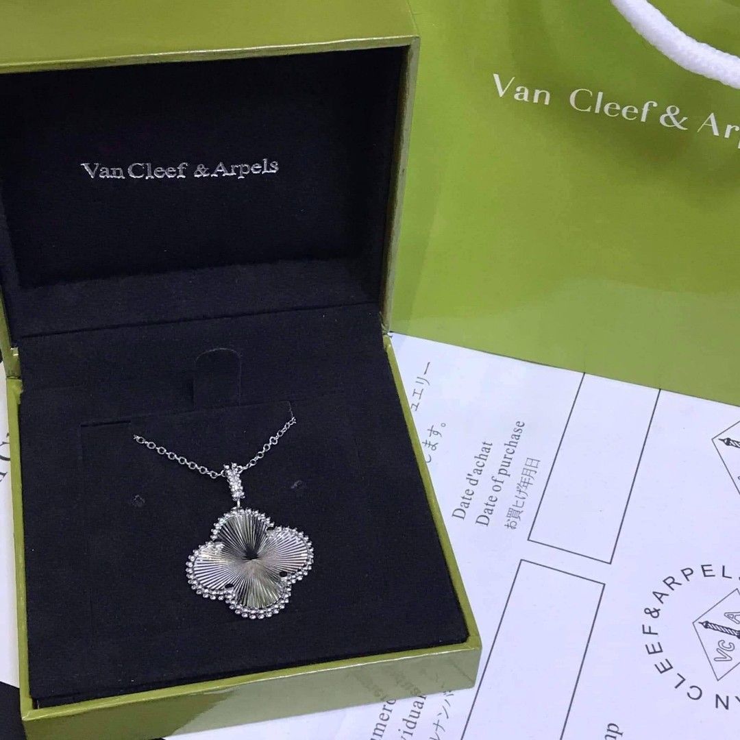 Van Cleef & Arpels Alhambra Necklace (Category: Luxury Accessories) located in Manila. Submitted by celstainlessjewelry (Listing ID 1428186929, Image 1). Description: Authentic Van Cleef & Arpels Alhambra necklace. Features a clover-shaped pendant with a delicate chain. Comes with the original box and shopping bag. The necklace is a classic design, perfect for adding a touch of elegance to any outfit. A timeless piece from a renowned luxury brand