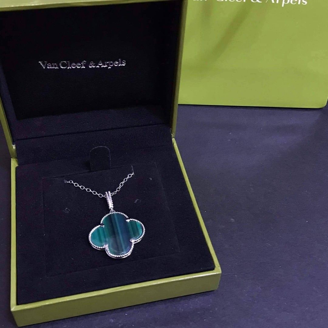 Van Cleef & Arpels Alhambra Necklace (Category: Luxury Accessories) located in Manila. Submitted by celstainlessjewelry (Listing ID 1428186929, Image 3). Description: Authentic Van Cleef & Arpels Alhambra necklace. Features a clover-shaped pendant with a delicate chain. Comes with the original box and shopping bag. The necklace is a classic design, perfect for adding a touch of elegance to any outfit. A timeless piece from a renowned luxury brand