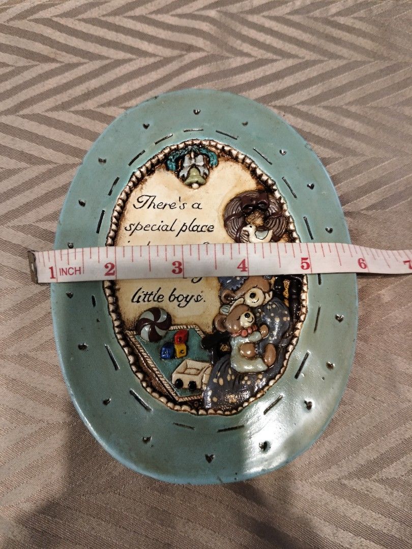 Vintage Oval Wall Decor (Category: Wall Decor) located in Manila. Submitted by newmoon-e25b (Listing ID 1428115587, Image 3). Description: Vintage oval wall decor features a heartwarming scene with a mother bear and her child. It has a light blue frame with the quote "There's a special place in heaven for mothers of little boys." The decor is approximately 6 inches wide and 7 inches tall. It's a charming piece for any room..