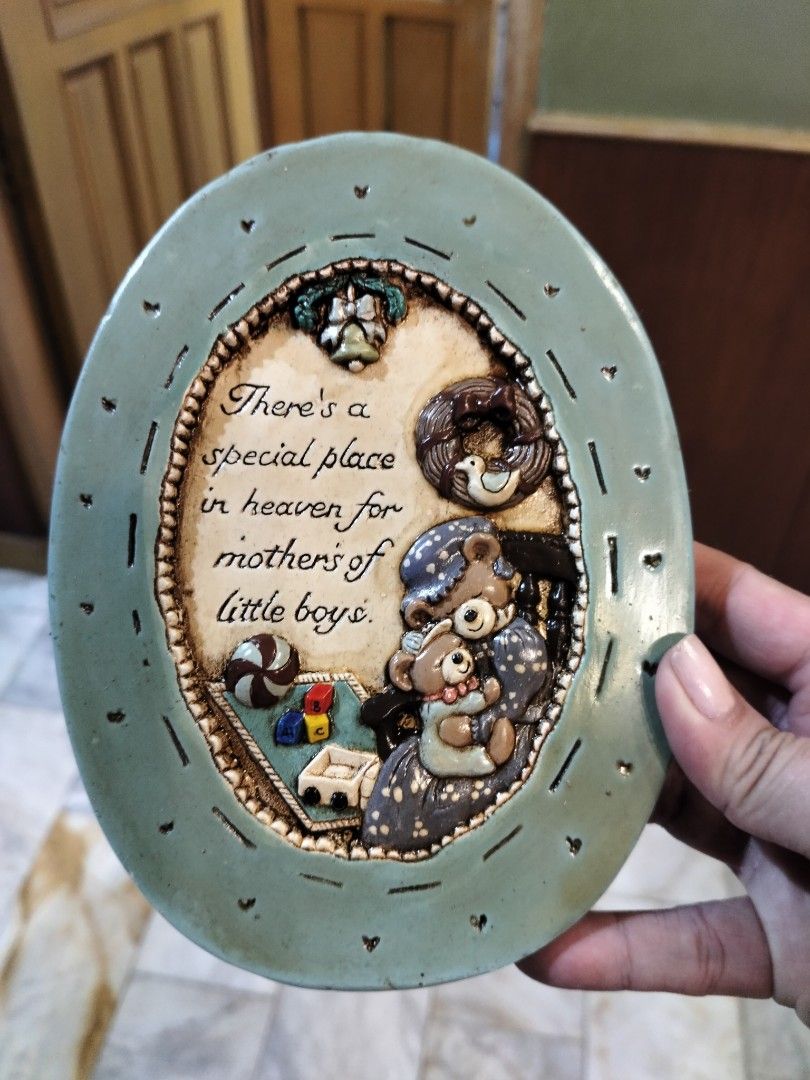 Vintage Oval Wall Decor (Category: Wall Decor) located in Manila. Submitted by newmoon-e25b (Listing ID 1428115587, Image 1). Description: Vintage oval wall decor features a heartwarming scene with a mother bear and her child. It has a light blue frame with the quote "There's a special place in heaven for mothers of little boys." The decor is approximately 6 inches wide and 7 inches tall. It's a charming piece for any room..