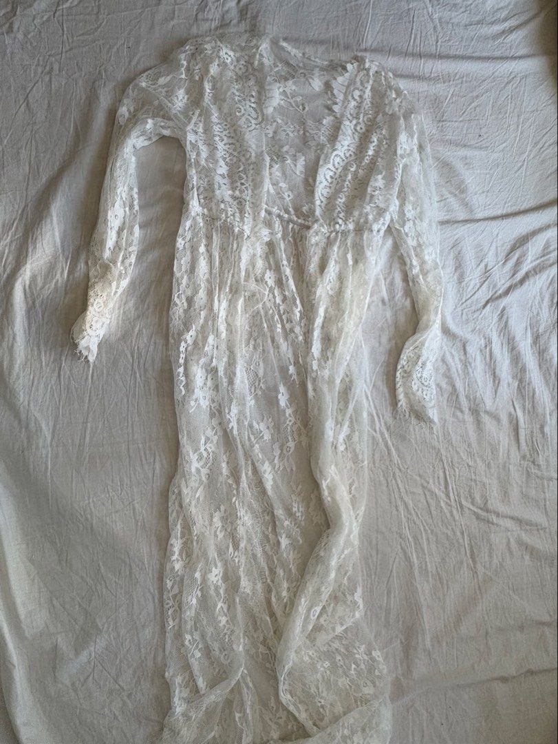 White Lace Maxi Dress (Category: Dresses) located in Cebu City. Submitted by declutterwithmecebu (Listing ID 1428240161, Image 1). Description: perfect for bridal or maternity shoot 🤍 Elegant white lace maxi dress. Features long sleeves and a flowing silhouette. Perfect for layering or as a cover-up. The dress has a delicate floral lace pattern throughout..