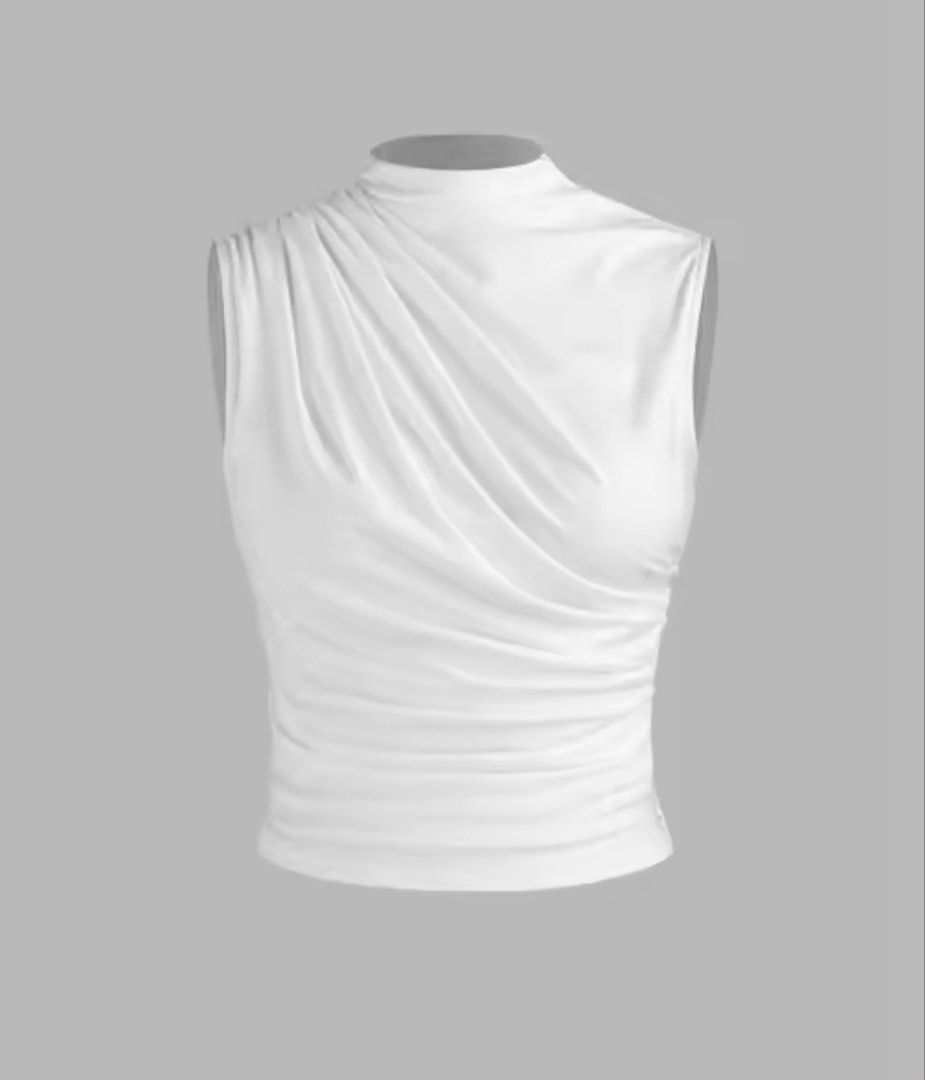 White Sleeveless Turtleneck Top (Category: Sleeveless) located in Cebu City. Submitted by declutterwithmecebu (Listing ID 1428239516, Image 3). Description: Elegant white sleeveless top featuring a stylish turtleneck design. The top has a flattering, ruched detail on the side. It's a versatile piece that can be dressed up or down. Perfect for creating a chic and sophisticated look. A great addition to any wardrobe..