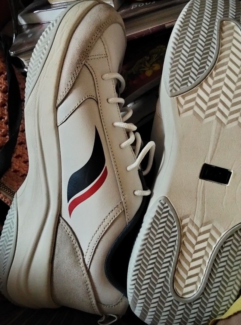 White Sneakers with Red and Blue Accents (Category: Sneakers) located in Quezon City. Submitted by housfo (Listing ID 1428114834, Image 1). Description: brand new. tight for my child. orig price 4k. leather.
