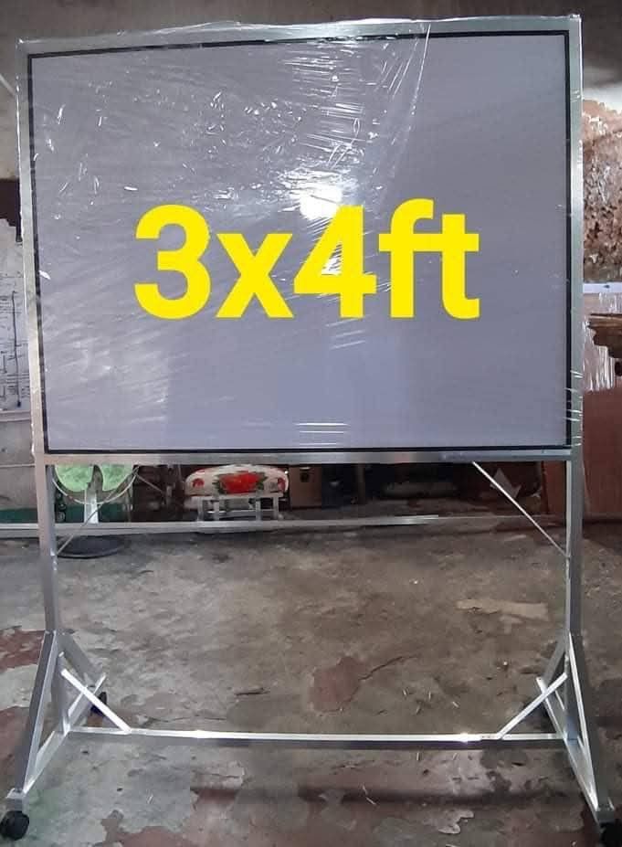 Whiteboard with Stand - 3x4ft, 3x5ft, 24x36 (Category: Office Furniture & Fixtures) located in Manila. Submitted by lieselrell90474 (Listing ID 1428201571, Image 3). Description: Whiteboards with stands available in various sizes. Sizes include 3x4ft, 3x5ft, and 24x36. The boards are mounted on a sturdy metal frame with wheels for easy mobility. Some units have a lower shelf for storage. The boards appear to be clean and ready for use..