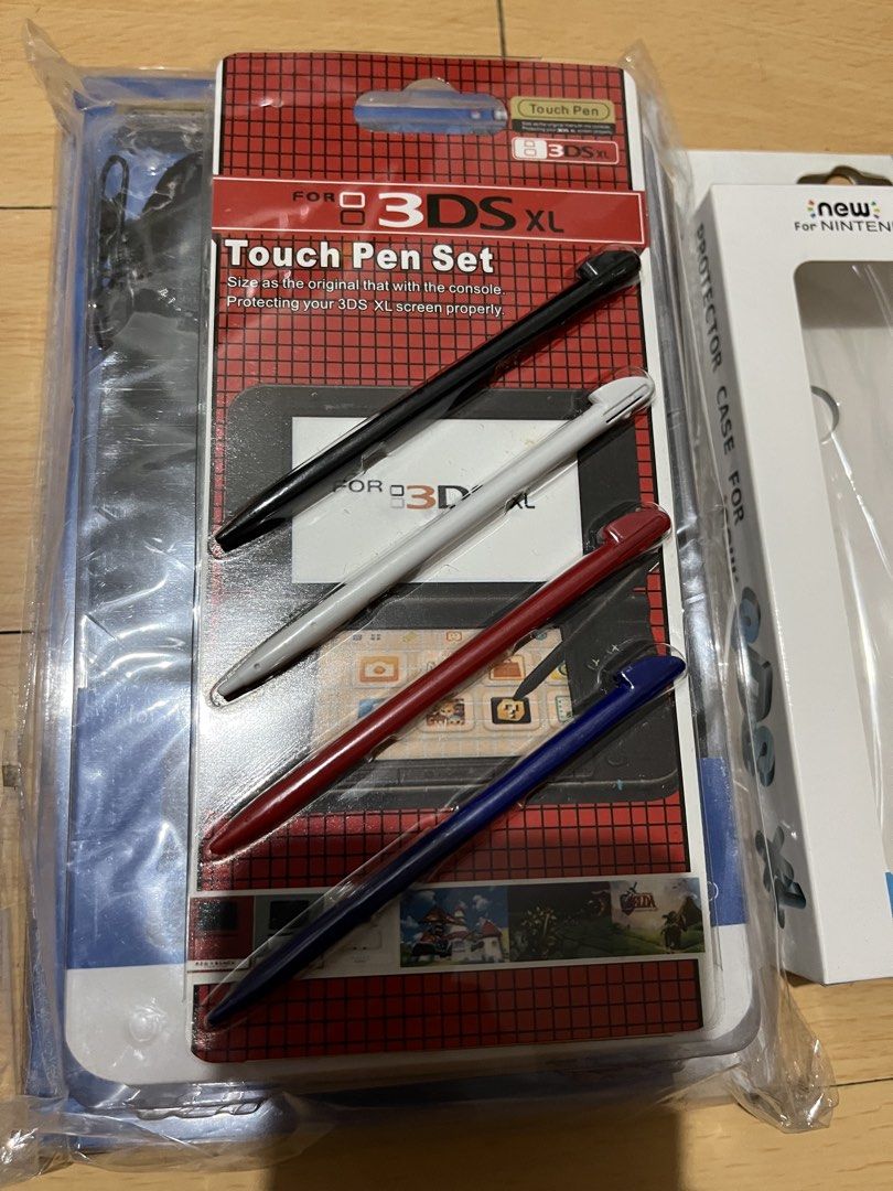 3ds accessories in ac charger (Category: Nintendo) located in Quezon City. Submitted by juhaire (Listing ID 1428407211, Image 3). Description: Available brand new 3ds xl or new xl Hard pouch 300 Clear case 250 Stylus pair 100 Ac charger 220.