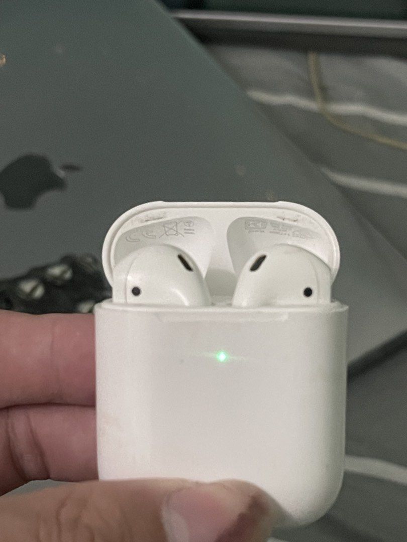 Apple AirPods 2nd Gen (Magsafe Compatible) (Category: Earphones) located in Caloocan City. Submitted by gsrys (Listing ID 1428363473, Image 1). Description: Well-used unit: - Charging case has visible stains/marks - Case still opens/closes smoothly and charges properly Issue : - AirPods (left & right) - Pods have degraded battery health - When removed from the case, they drain extremely fast - Ideal for parts, repair, or replacement units selling