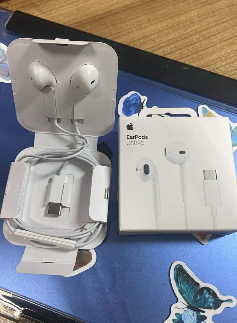 Apple EarPods USB-C (Category: Earphones) located in Manila. Submitted by milasgadgetph (Listing ID 1428260497, Image 1). Description: Genuine Apple EarPods with USB-C connector. Comes with the original packaging. The earphones are white. The box shows the EarPods and the USB-C connector. The packaging includes the earphones and the cable..
