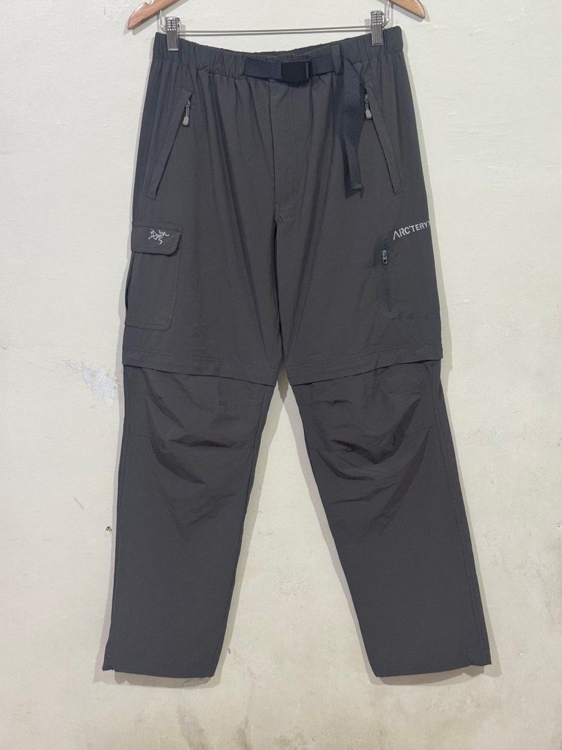 Arc'teryx - Convertible Cargo Hiking Pants (Category: Trousers) located in Manila. Submitted by sophisticatedgoons (Listing ID 1428369684, Image 1). Description: Arc'teryx Cargo Pants Convertible Zip-off Legs transform into shorts Tagged size: L but fits Medium men's Very good condition No issue Reflective spell out arcteryx logo Measurements: Waistline: 30 - 34 (stretchable) Length: 40.5" (Pants) 20" (Short) Leg opening: 8" inches .