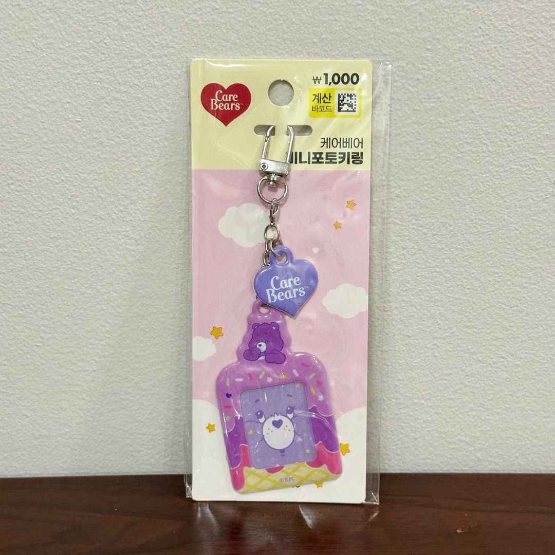 [Authentic] Care Bears Mini Photo Keychain (Category: Character Goods) located in Quezon City. Submitted by brandedusagoodies (Listing ID 1428392499, Image 1). Description: A cute Care Bears mini photo keychain featuring colorful pastel bear designs with an ice cream theme. This keychain includes a small frame where you can insert a tiny photo, making it a fun and personal accessory for bags or keys. Material: • Acrylic / Plastic Color / Design: 
