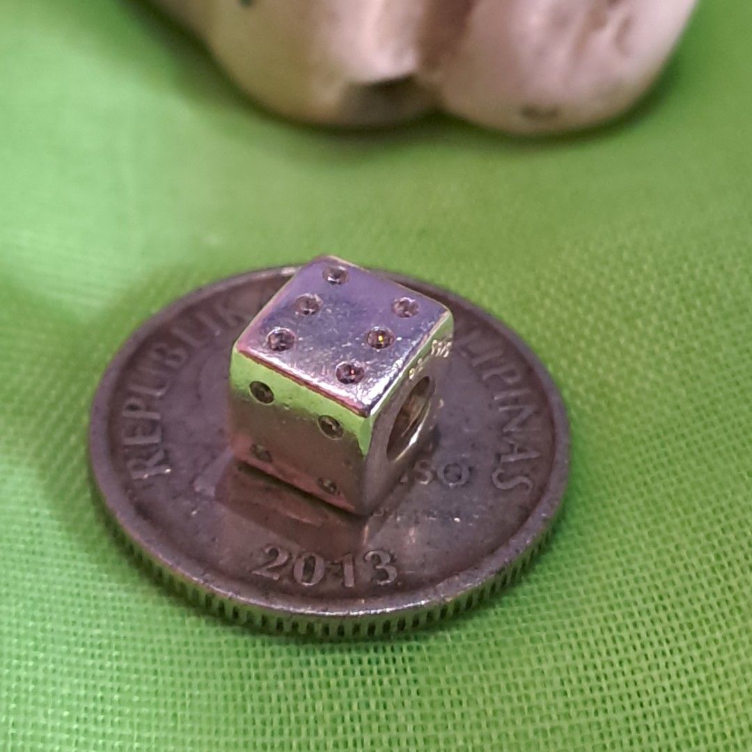 Authentic Pandora Dice Silver Charm with CZ stones (Category: Charms) located in Santa Cruz. Submitted by cedrick17 (Listing ID 1428367211, Image 2). Description: authentic Pandora Silver dice with cz stones can be charm or pendant .