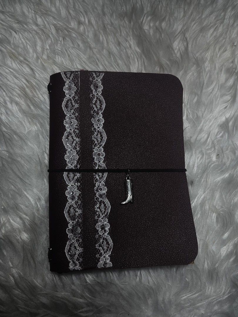 Bi-fold Leather Journal in maroon locked design (Category: Stationery & School Supplies) located in Manila. Submitted by __maipages (Listing ID 1428270503, Image 1). Description: inclusions - Eyelet ( copper, gold, metal, silver) - elastic ( pink, black, blue, beige, maroon ) - 1 free charm -1 free refill notebook - free box.