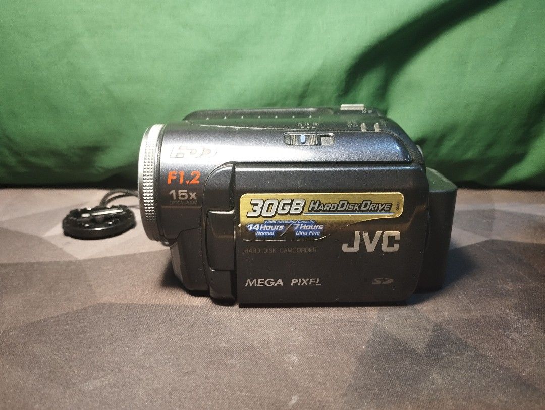 Camcorder (Category: Video Cameras) located in Quezon City. Submitted by santinooo (Listing ID 1428357639, Image 1). Description: JVC Everio GZ-MG50u ❗selling for 2,000php ❗ - No functional issues, all buttons are working - Zoom working - video working - picture working -with 30GB HDD storage ‼️MUST READ‼️ ISSUE: May temperature error or HDD error everytime bubuksan but I think pwede ipaayos.. (Sometimes it works normally, but most of the time it