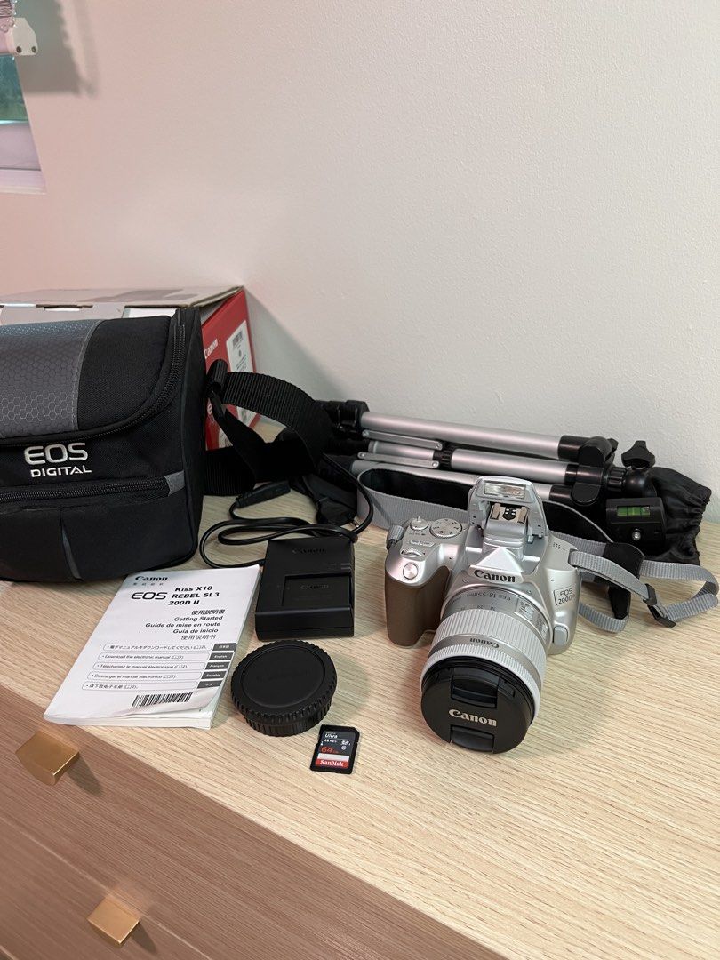 Canon EOS 200D Mark II (Limited Color) (Category: Cameras) located in Manila. Submitted by sheenaaaa_ (Listing ID 1417160503, Image 2). Description: Original Price: ₱48,000 RFS: Bought only for a college photography subject Features: • Lens: Canon EF-S 18-55mm 1:4-5.6 • 4K Video • Touchscreen & Flipscreen • Wifi & Bluetooth ready • Can connect to canon camera connect app • 24 megapixels • Good for selfie or vlogging • Articulating Screen • Face D