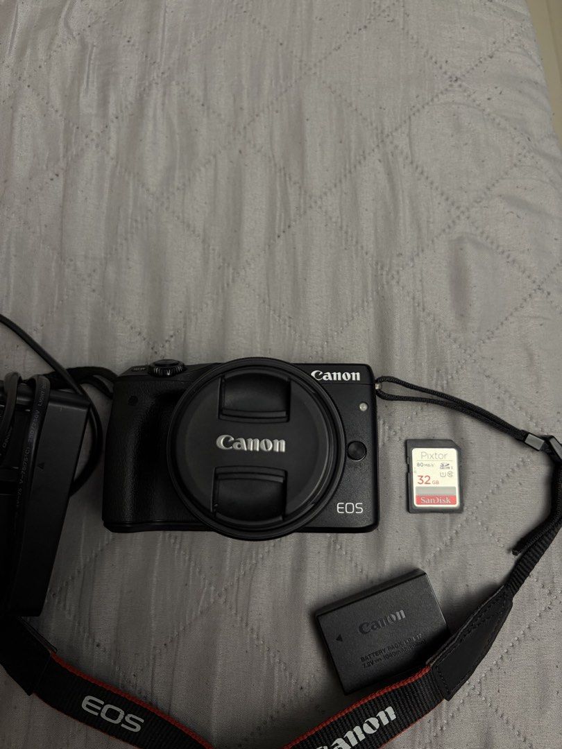 Canon EOS M3 Mirrorless Camera/G7x Dupe (Category: Cameras) located in Manila. Submitted by _jillianvllrs (Listing ID 1428366345, Image 2). Description: Canon EOS M3/G7x dupe Inclusions: SD Card Charger 1 Battery 1 Lens cap Camera Strap With built-in Wi-Fi PM for sample shots ✨ Open for meet-up (Taguig, Parañaque, Pasay, Manila) rfs: just got from my tita from us and i dont usually use it.