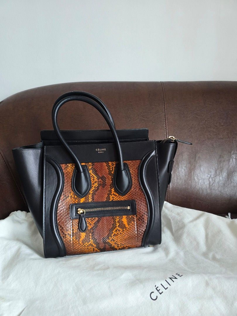 Celine Phantom Python Leather Handbag (Category: Bags & Wallets) located in Singapore. Submitted by candycrush2 (Listing ID 1428301987, Image 2). Description: Authentic Celine Phantom handbag. Part of the old Celine collection! Features a striking python leather front panel and black leather trim. Includes dust bag and tag. Interior has a zipped pocket and a small pocket. Excellent condition, well-maintained. Never worn! .