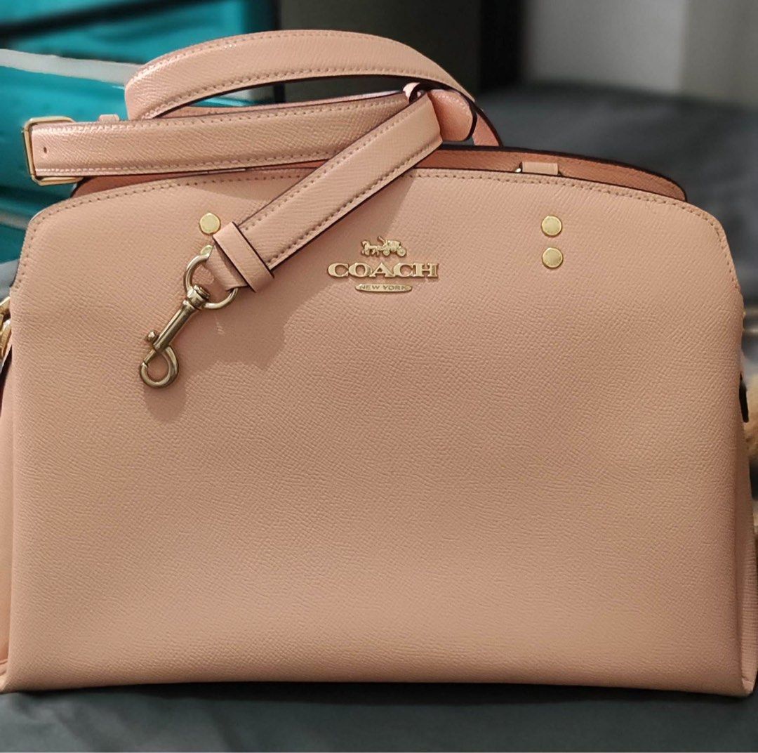 Coach Lillie Carryall (Category: Luxury Bags & Wallets) located in Las Pinas. Submitted by chelooooogs (Listing ID 1428408869, Image 1). Description: **This is seasonal release color **Lillie Carryall (Large) size 12.75”L x 8.75”H **with adjustable & detachable long strap **Used once, but no sign of usage (like new) **Guaranteed authentic.