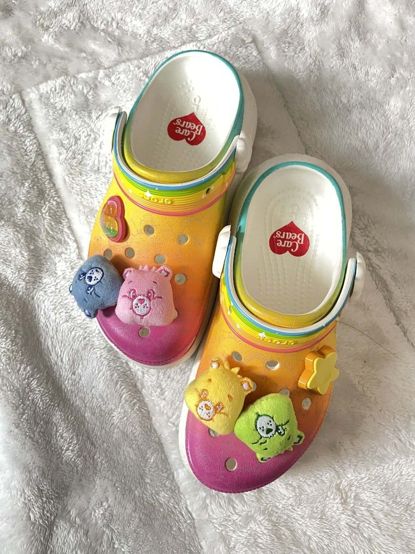 CROCS Care Bears Clogs with Jibbitz ORIG (Category: Slippers and slides) located in Dagupan City. Submitted by chichi_declutter (Listing ID 1428427699, Image 1). Description: ~ORIG ~M4 W6 ~Original Crocs CARE BEAR collab ~Made in Vietnam ~Comes with free jibbitz.