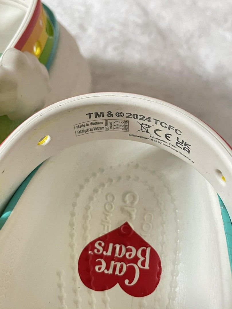 CROCS Care Bears Clogs with Jibbitz ORIG (Category: Slippers and slides) located in Dagupan City. Submitted by chichi_declutter (Listing ID 1428427699, Image 3). Description: ~ORIG ~M4 W6 ~Original Crocs CARE BEAR collab ~Made in Vietnam ~Comes with free jibbitz.
