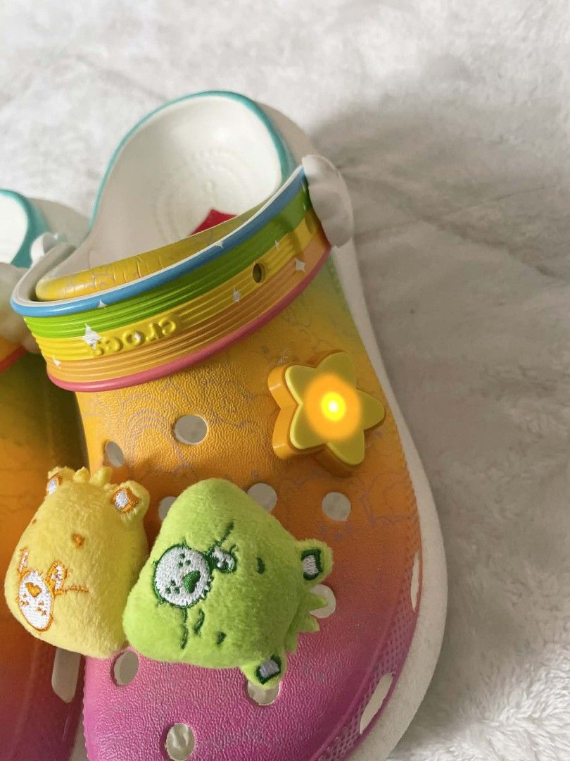 CROCS Care Bears Clogs with Jibbitz ORIG (Category: Slippers and slides) located in Dagupan City. Submitted by chichi_declutter (Listing ID 1428427699, Image 2). Description: ~ORIG ~M4 W6 ~Original Crocs CARE BEAR collab ~Made in Vietnam ~Comes with free jibbitz.