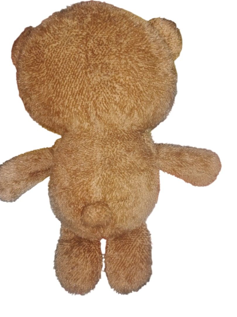 Despicable Me Tim Bear Bob Minion Plush Toy (Category: Plushies & Soft Toys) located in Manila. Submitted by harpercbrr36253 (Listing ID 1428303841, Image 2). Description: Tim plush toy from the Despicable Me franchise. It features a brown fur, button eyes, and a pink tongue. The tag indicates it is a SEGA product. The plush toy has a cute and unique design, perfect for fans of the movie. 19 inches huggable plushie.