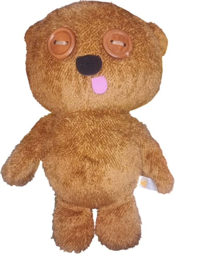 Despicable Me Tim Bear Bob Minion Plush Toy (Category: Plushies & Soft Toys) located in Manila. Submitted by harpercbrr36253 (Listing ID 1428303841, Image 1). Description: Tim plush toy from the Despicable Me franchise. It features a brown fur, button eyes, and a pink tongue. The tag indicates it is a SEGA product. The plush toy has a cute and unique design, perfect for fans of the movie. 19 inches huggable plushie.