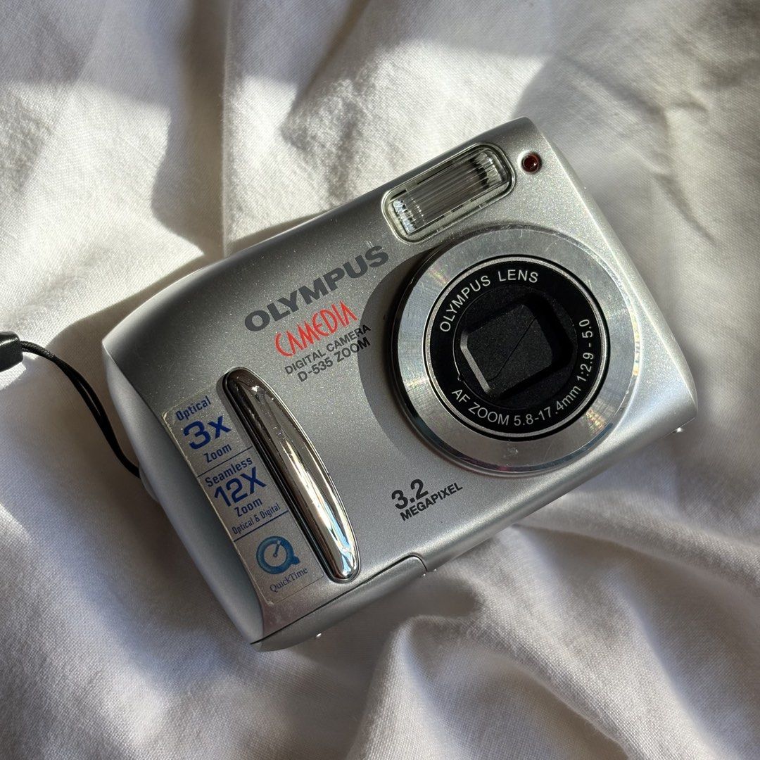 DIGICAM OLYMPUS CAMEDIA D-535 ZOOM DIGITAL CAMERA (Category: Cameras) located in Manila. Submitted by la.memoriaph (Listing ID 1428353881, Image 1). Description: Body: 10/10 3.2 MP | Released in October 2004 Uses XD Card & 2 pcs. Double A Battery TESTED: All posted photos are RAW FULLY FUNCTIONAL NO ISSUE - BOXED WHAT’S ON THE BOX: • Unit • Box, Cord, Papers & CD • Pouch • Beaded Wrist Strap • Stickers • Card Reader & Memory Card (Sold Separately