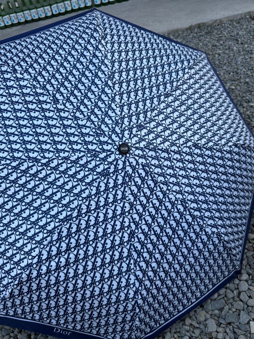 Dior Oblique Pattern Umbrella (Category: Umbrellas) located in Angeles City. Submitted by secondluxph (Listing ID 1428420855, Image 1). Description: - Dior Oblique Pattern Umbrella - Trotter Canvas Foldable - Condition: 9.5/10 - No flaws sign of usage only.
