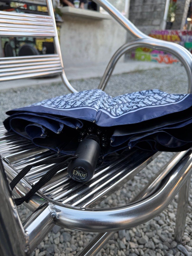 Dior Oblique Pattern Umbrella (Category: Umbrellas) located in Angeles City. Submitted by secondluxph (Listing ID 1428420855, Image 2). Description: - Dior Oblique Pattern Umbrella - Trotter Canvas Foldable - Condition: 9.5/10 - No flaws sign of usage only.