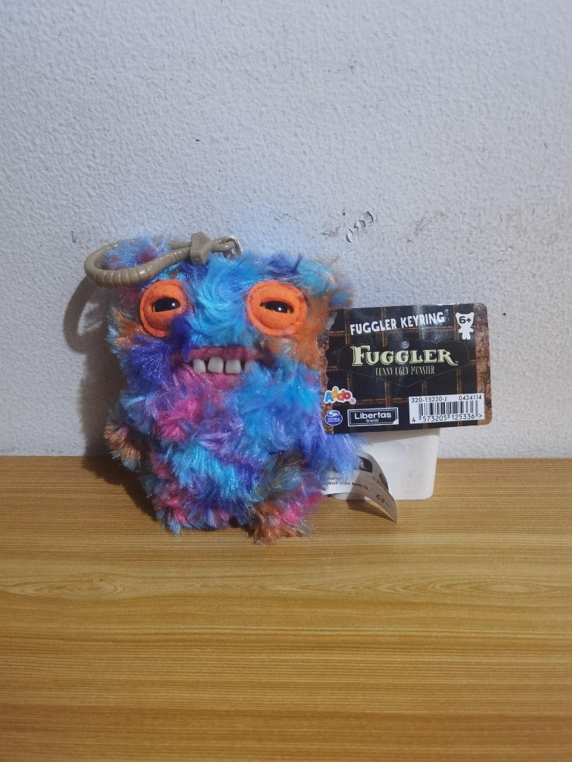 Fuggler - Mr. Buttons Plush Charm (Category: Plushies & Soft Toys) located in Taguig. Submitted by kalabasza (Listing ID 1428423856, Image 1). Description: 📌 Brand New with Paper Tag pa po. 📌 Actual item posted. 📌 Item is in good condition. 📌 Product Color may slightly vary due to Photographic Lighting. 📌 Location: Taguig 📌 MOP: GCash. Payment first before ship. 📌 MOD: J&T, LBC, GoGo or Lalamove. 📌 DF/SF at buyer's expense. 📌 No rush shi