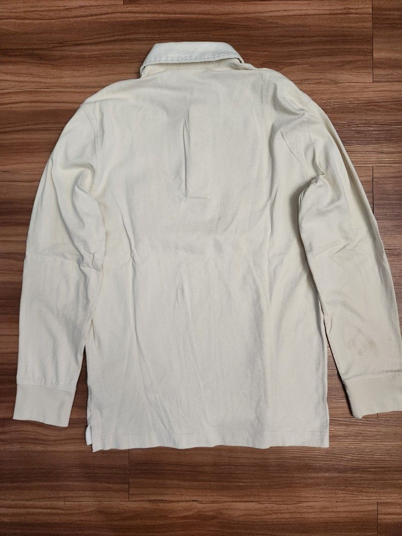 H&M Rugby Shirt - Beige (Category: Tshirts & Polo Shirts ) located in Malabon City. Submitted by silverrust12 (Listing ID 1428289806, Image 2). Description: H&M Rugby Shirt in Beige Bought from store Original price around Php 1,290 Size on tag - XS Pit-to-pit - 47 cm Length - 69 cm (Front), 70 cm (Back) Sleeve length - 59 cm Will be washed and will send more pics upon reservation NCR area Can do meet-ups around SM North or anywhere near LRT stati