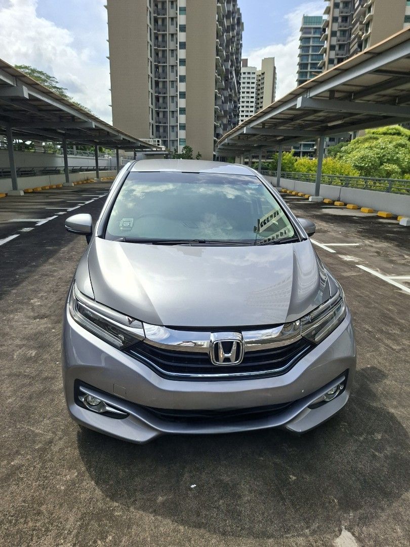 Honda Shuttle Hybrid passenger station wagon Auto (Category: Used Cars) located in Singapore. Submitted by serenetong (Listing ID 1428276487, Image 2). Description: .