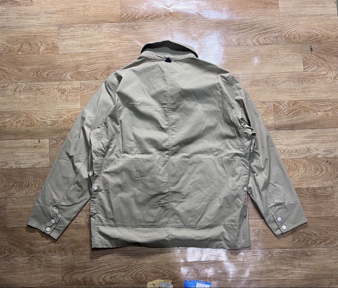 Jack Wolfskin Jacket (Category: Coats, Jackets and Outerwear) located in Zamboanga. Submitted by alterramz08 (Listing ID 1428413212, Image 3). Description: Jack Wolfskin Multi pocket Jacket Size xl W25 L30 Price ; 800 Jack Wolfskin jacket. Features multiple pockets, including two chest pockets and two lower pockets. The jacket has a button-up front and buttoned cuffs. The Jack Wolfskin logo is visible on the collar and a small tag on the pocket. 